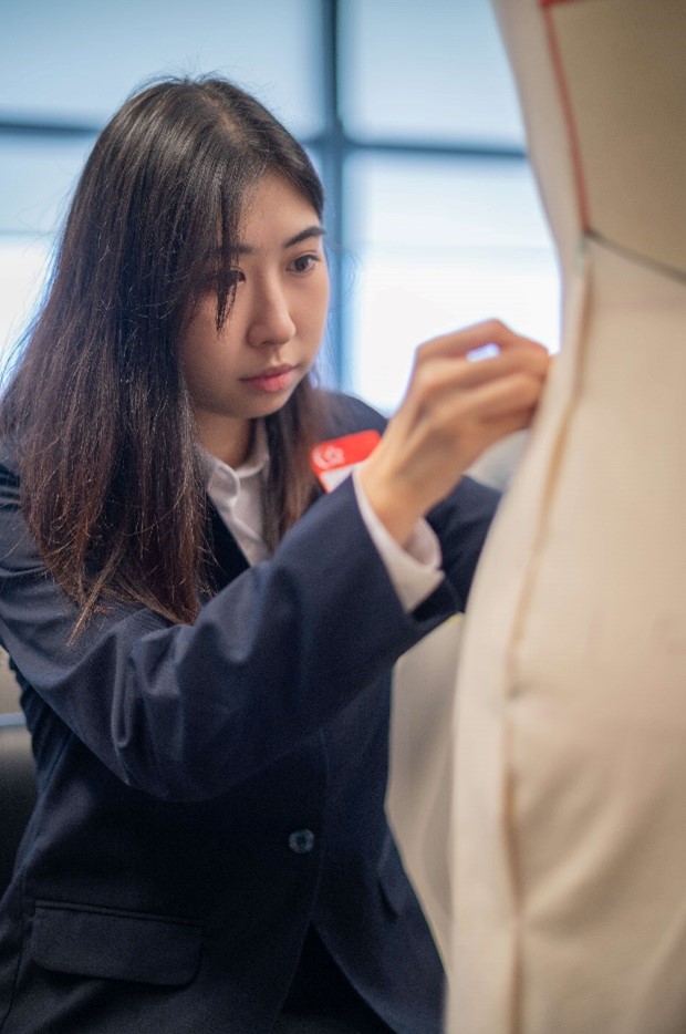 Jamaine Teo at WorldSkills in the skills area of fashion technology